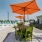 Rooftop pool area w/ umbrellas