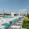 lounge chairs by rooftop pool