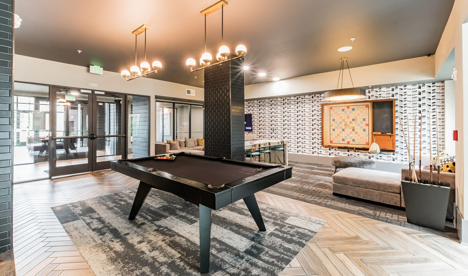 Beautiful clubroom with lounge seating and billiards